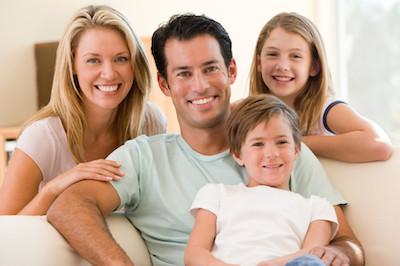 A smiling family at home