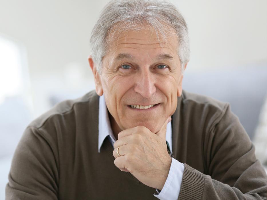 man with grey hair smiling l cosmetic bonding wilmington