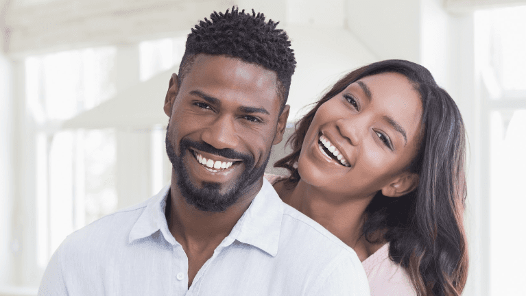 A smiling couple | dentist wilmington