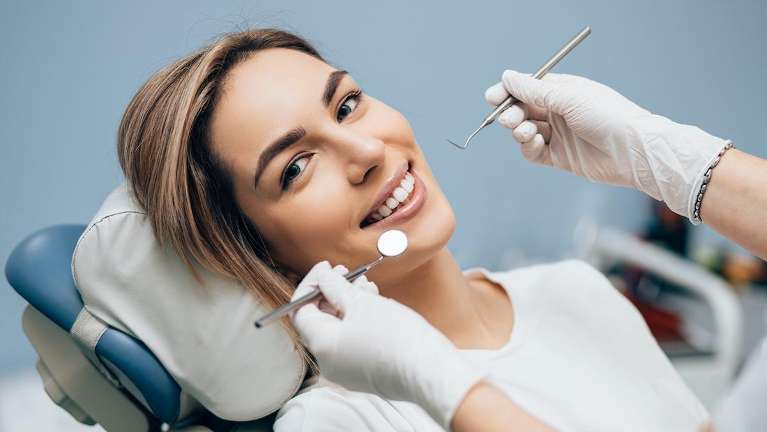 A woman getting a dental checkup