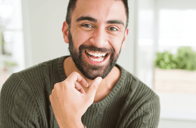 A man laughing | cosmetic dentist Wilmington, DE