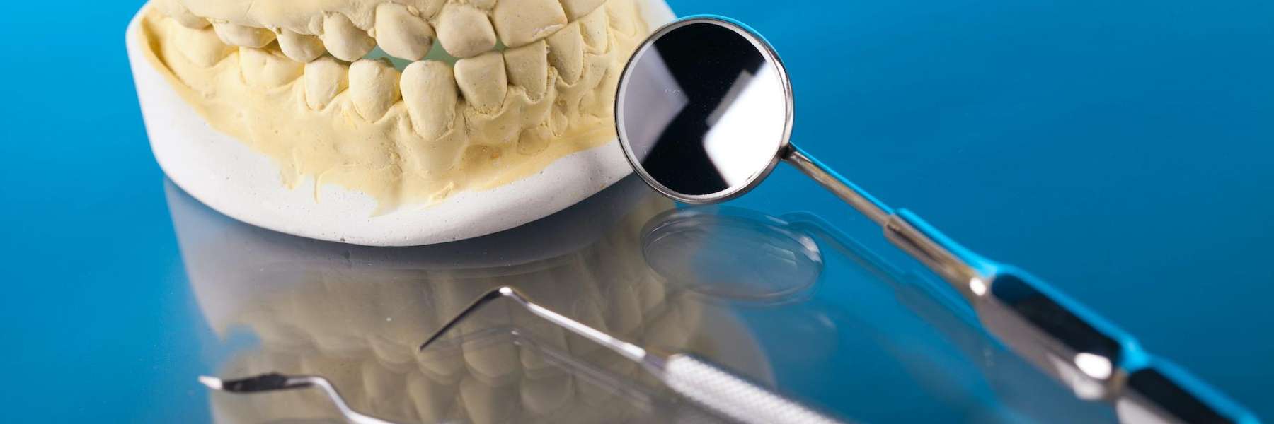 A dental mold and dental tools | dentist Wilmington