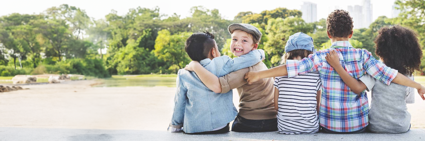 A group of five children at the park