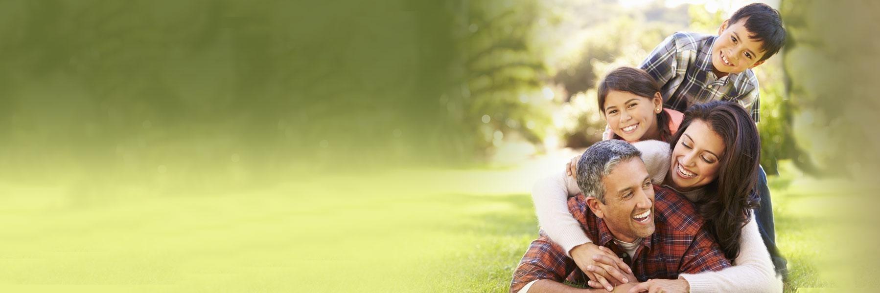 young family playing outside l orthodontics in Wilmington, DE