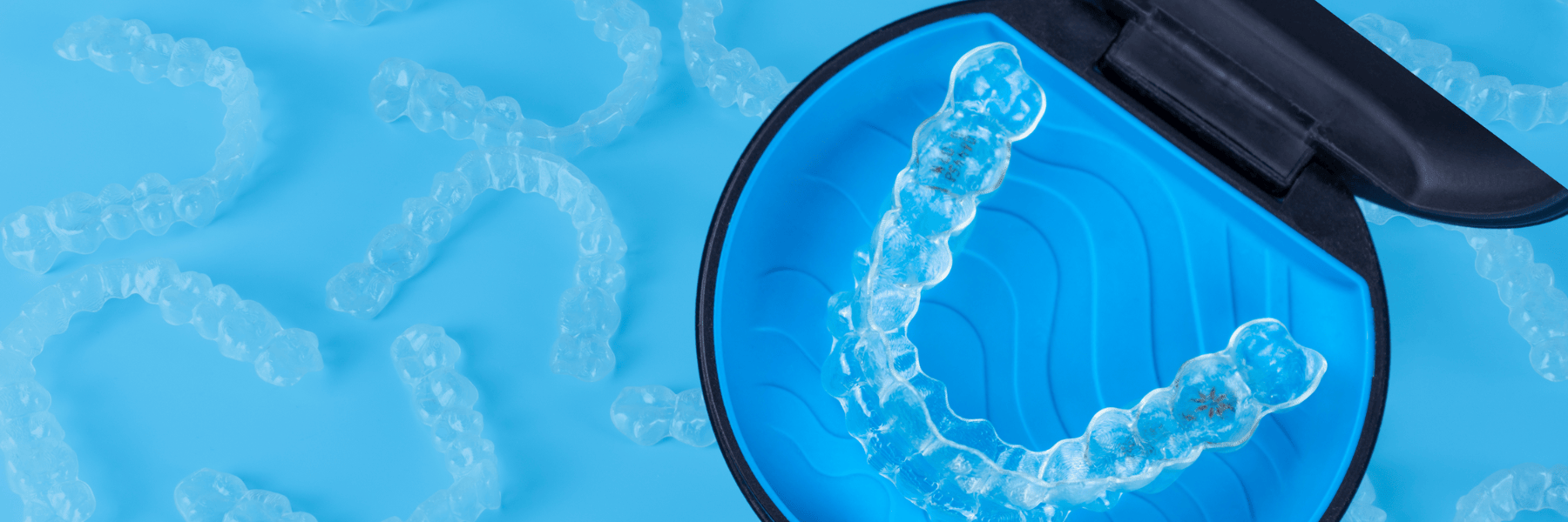 young couple hugging l invisalign wilmington